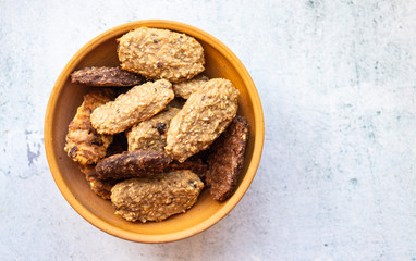 Homemade oatmeal granola bar cookies. Sweet vegan dessert on breakfast.