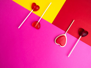 Sweet hearts on colorful background.