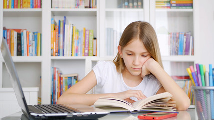 Kid Reading a Book in Library, Child Learning, Writing for Homework School, Schoolgirl Studying from Home due to Coronavirus Pandemic Crisis, Children Homeschooling, Online Education