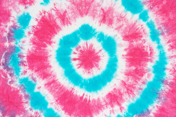 colorful tie dye pattern hand dyed on cotton fabric abstract texture background.