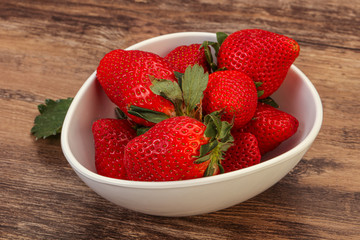 Ripe sweet strawberry with leaf