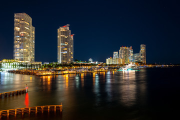 Fototapeta na wymiar Miami Beach , Florida, USA, Miami Beach city skyline with night sky. Miami Beach with next to the city line.