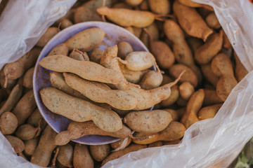 Tamarind fruits being sold on the market.