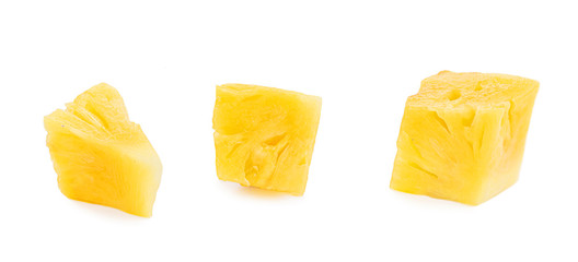 Fresh sliced pineapple isolated on white background. Pineapple chunks close up..