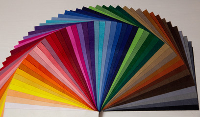 multicolored felt close up laid out by colors in expanded form