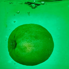lemon in green liquid
