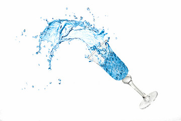 water spilling out of a falling cup