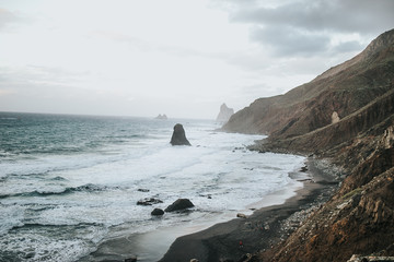 waves crashing on rocks