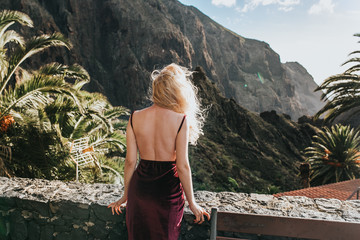 young woman on a rock