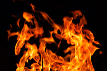 flames on a black background
