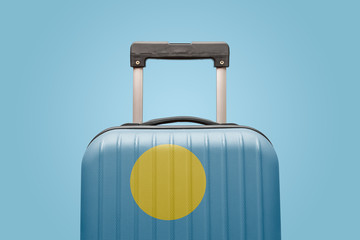 Baggage with Palau flag print tourism and vacation concept.