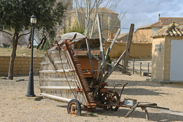 Fototapeta na wymiar Old abadoned farm machinery in Castile region, Palencia province, Spain