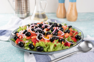 A large plate of greek salad.
