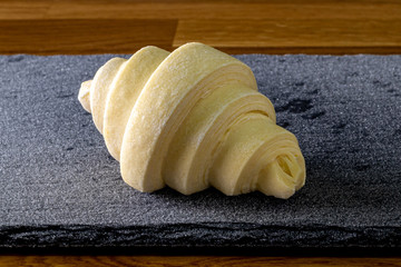 the croissant before preparation of semi-finished baking