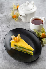 Tropical mango torte, birthday cake with mango souffle and a layer of kiwi jam