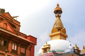 View of traditional gold colored stupa of tibetan buddhist Drugon Jangchu Monastery in Thamel...