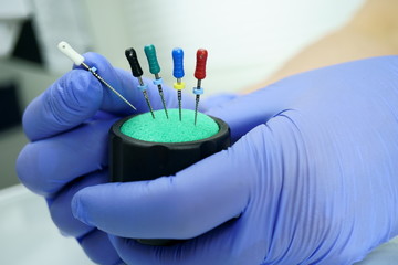 An endodontist doctor works with a verifier. Professional in his field.