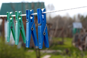 clothesline with clothespins on a blurry background