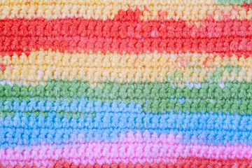 Fototapeta na wymiar Knitted texture, woolen product, homework, hobbies, knitting, needlework.
