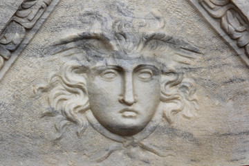 Relief of Medusa Gorgo on the sarcophagus in Caesarea Maritima, Israel