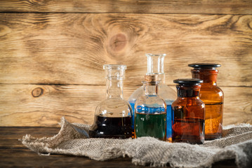 Magic potion bottles on the witch doctor table. Witchcraft.