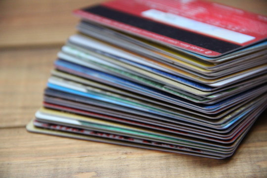 Pile of different credit cards close up
