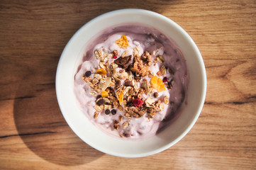 A healthy breakfast with delicious chocolate and strawberry muesli