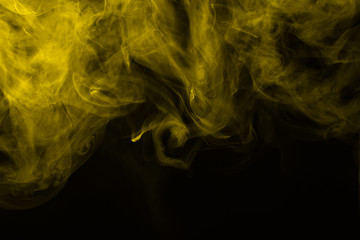 Yellow steam on a black background.