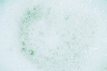 Green lather background, top view.