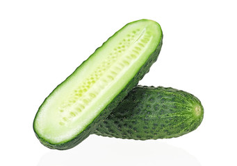 Ripe cucumbers isolated on a white background. Fresh green cucumbers and slice.