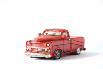 red pickup isolated on white background. Image contains copy space