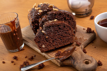 sliced brownie covered with chocolate ganache with coffee