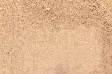 Top view sand background and texture on the beach. Abstract Sandy free space for text.