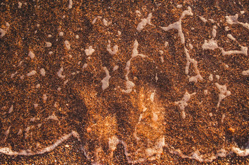 Footprints washed off with water. Vacation background.