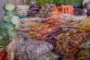 Fototapeta premium Tropical fruits at a market stall in an Asian market.
