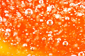 Macro bubbles of oxygen in the blood. Red-orange liquid.