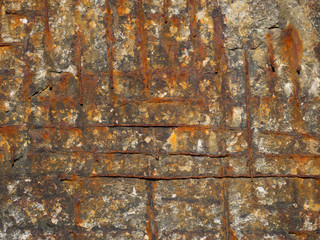 Beautiful pattern of rust and salt on the concrete wall of an ancient sea fort.  Concept for the designer.