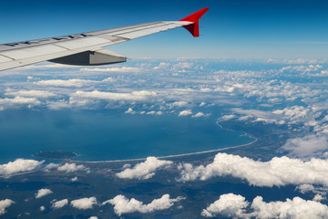 Fototapeta na wymiar Ocean bay view from the airplane