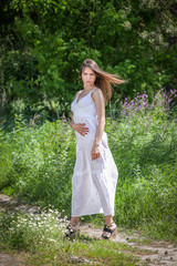 Young woman in white dress