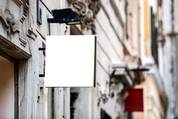 Square blank signboard on the street in the city - Image