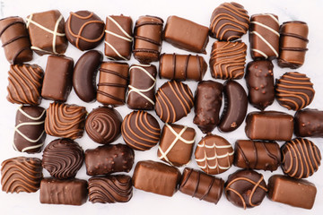 Delicious chocolates different shapes and taste