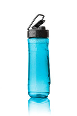 Plastic blue sports bottle is covered with droplets
