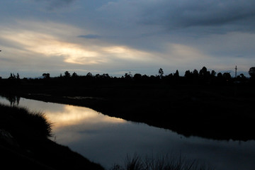 Sunset over the Bogotá river