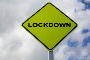 Yellow Sign with lockdown word. COVID-19 lockdown, quarantine concept