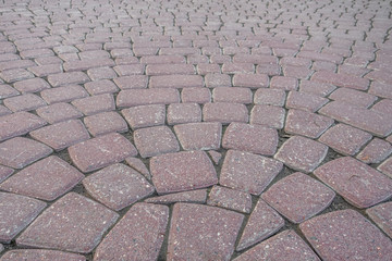 laid out in a circle tiles on the track in the park