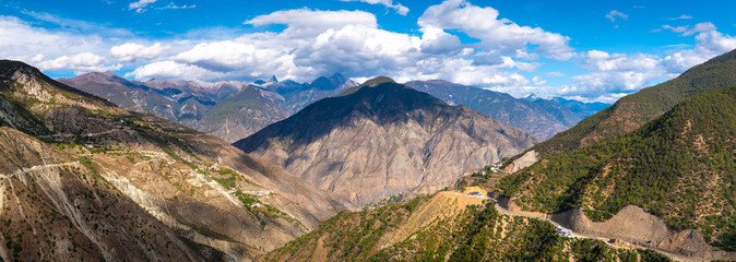 Fototapeta na wymiar Panorama view of Autumn Himalaya mountain scene in Shangrila China