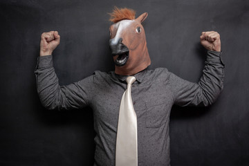 Horse head businessman 