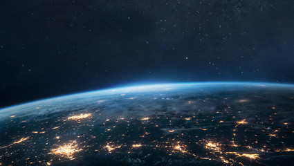 Nightly planet Earth in space. Orbit of the planet. City lights on surface. Elements of this image furnished by NASA