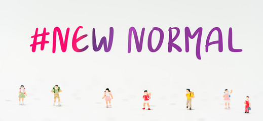 Back to school.Miniature student children wearing masks ready for primary school.Pupil on first day of classes.Covid-19 Coronavirus crisis.New normal, Social distancing.Education Healthcare People.