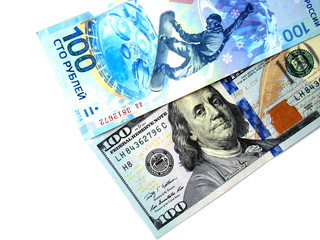 100 rubles and 100 dollars on a white background
